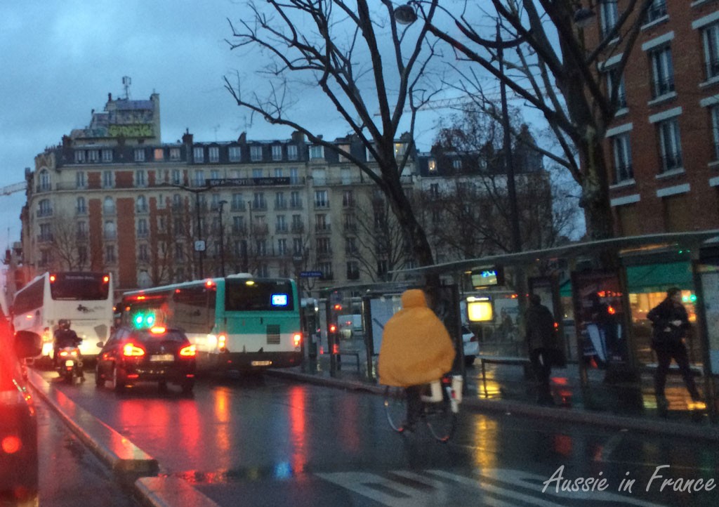 Rainy streets of Paris at sunrise