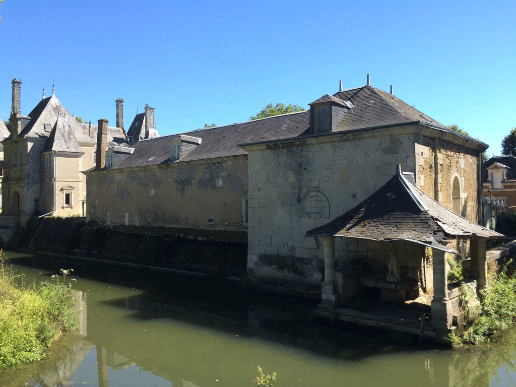 The moat and boat landing at Château de Mézière