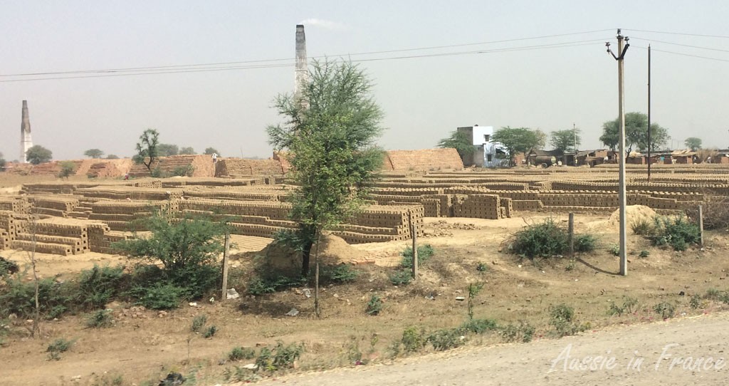 Brick factories and stocks on the road to Agra