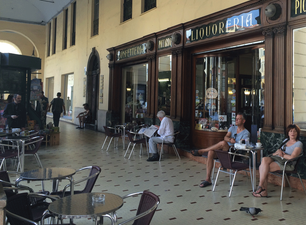 Watching the locals having their Sunday coffee and pastry