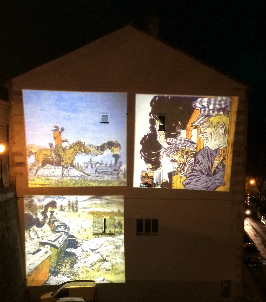 Comic strips at night on an otherwise blank wall