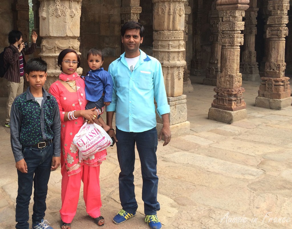 An Indian family at Minar. I find the little boy's black eyes very worrying.