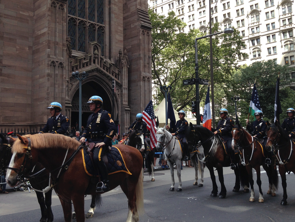 The parade about to begin next to Trinity Church on Broadway