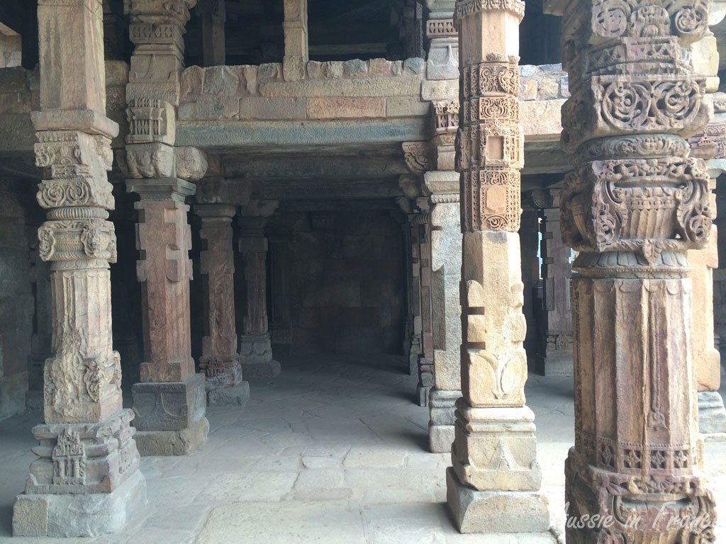 Pillars from the original Hindu temple at Qtub Minar. Depictions of animals in particular have been removed.