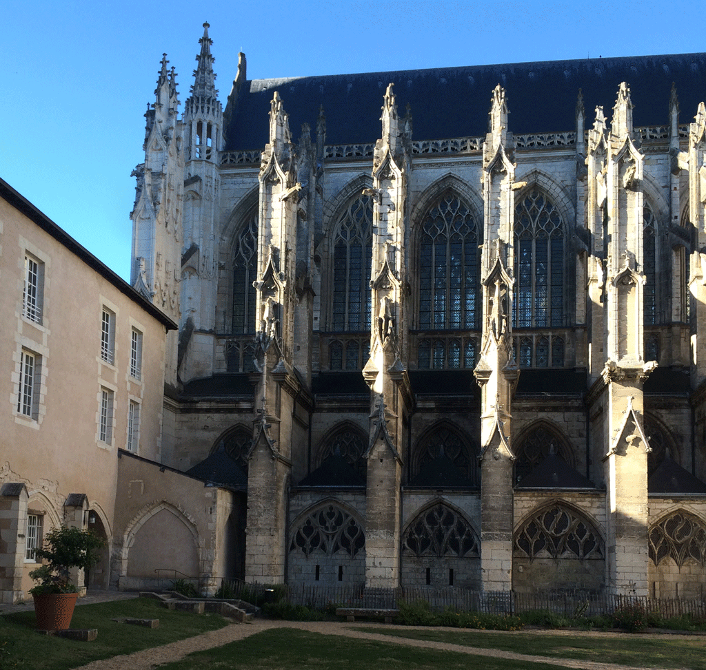 The sun setting over the buttresses of the Cathedral