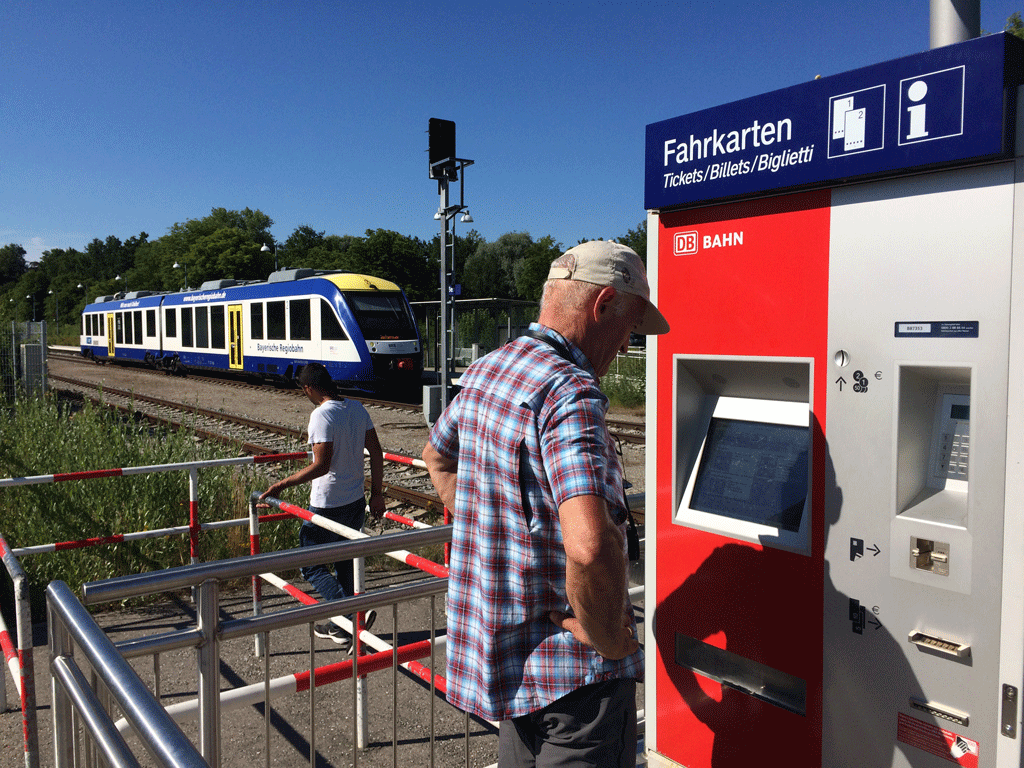 Jean Michel examining the ticket machine in Diessen