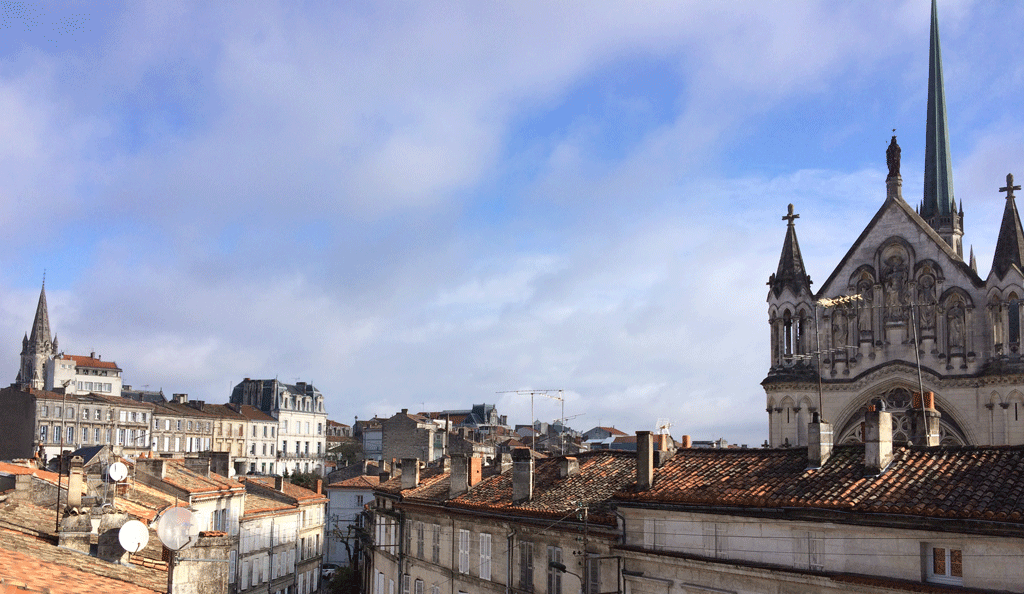 The cathedral spires are on the left and xxx on the right