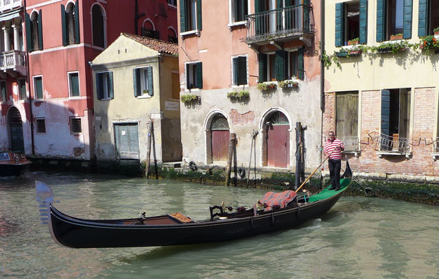 Alessio, our gondolier, coming to meet us