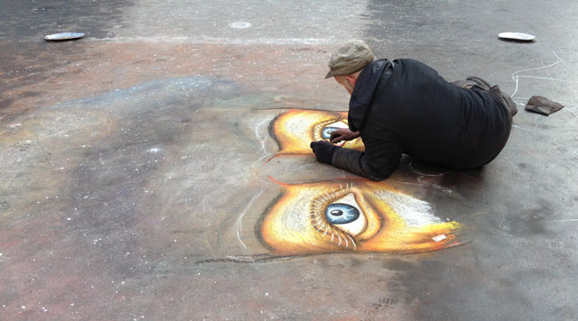 Pavement artist on Place du Palais Royal at 1°C.