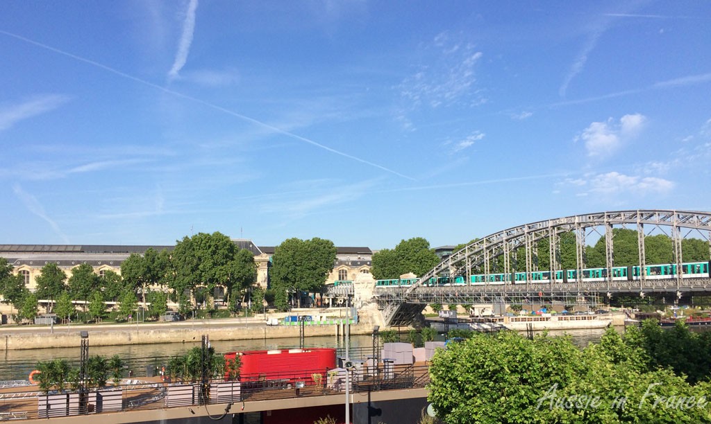 View of Austerlitz train station and bridge from the opposite side of the Seine