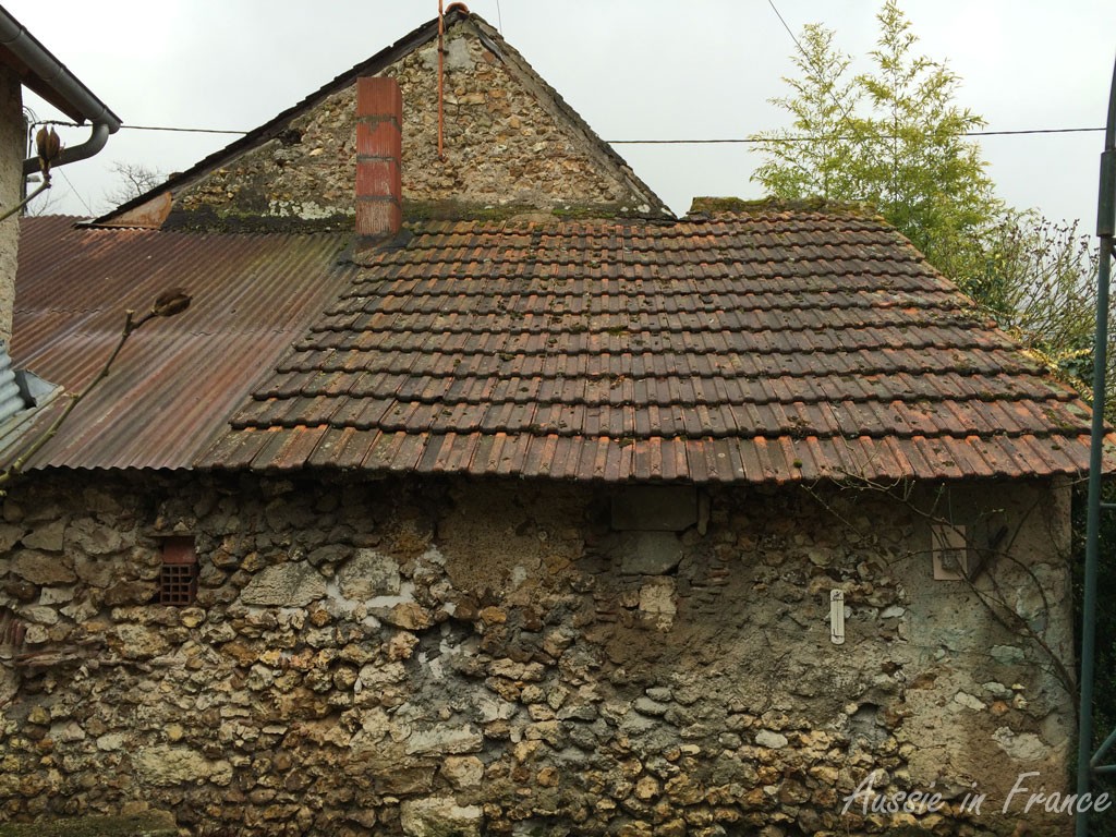 The back of the little house whose roof will disappear