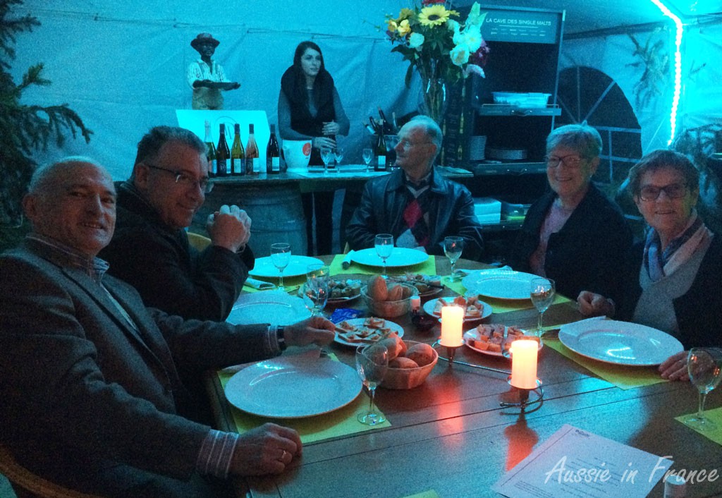 Sharing an appetizer platter inside Eric Bacon's tent