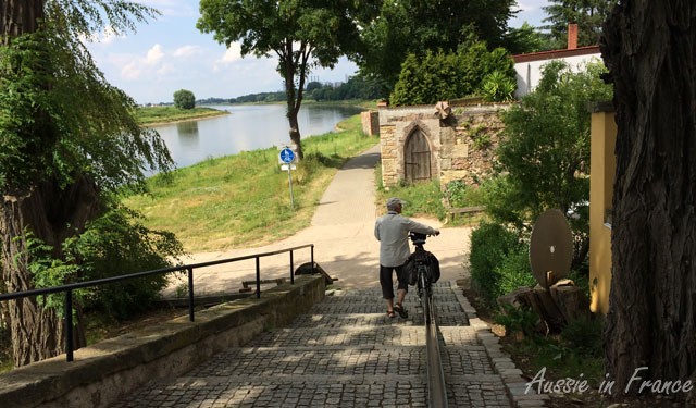 The bike paths sometimes have steps with bike wheel runners