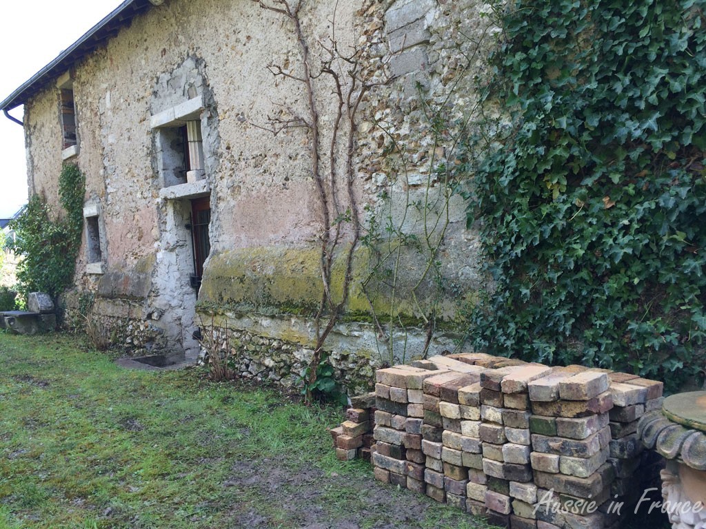 The kitchen window will be made after the small window on the left.