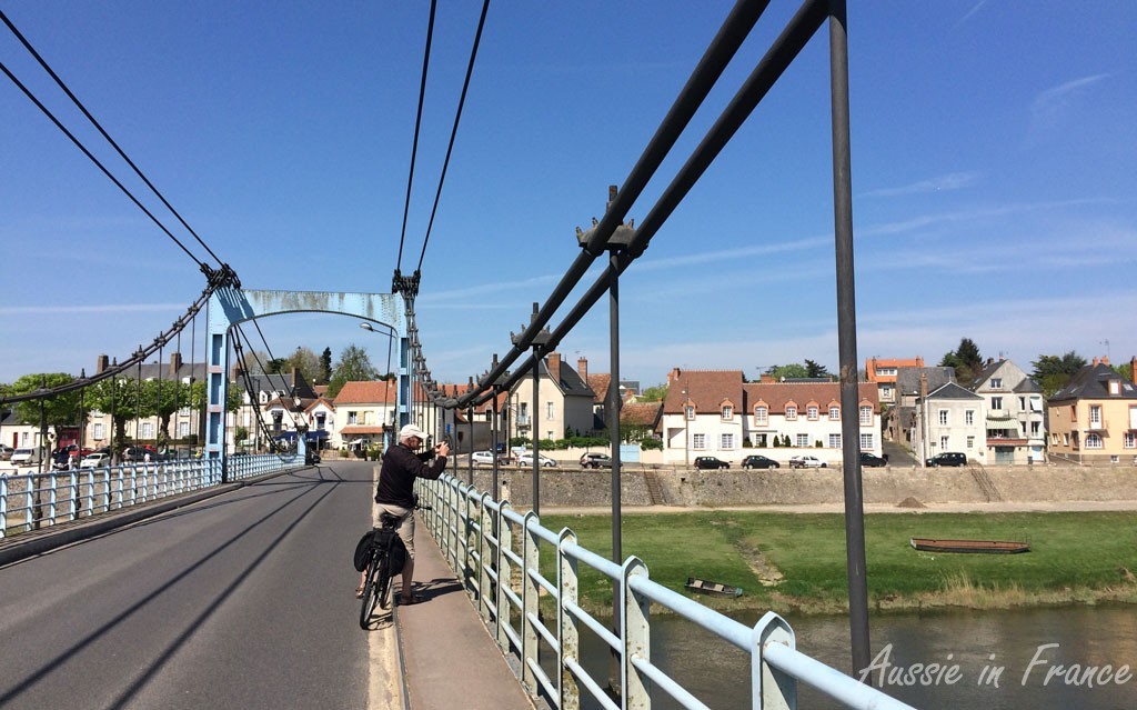 Jean Michel halfway across the bridge at Châteauneuf