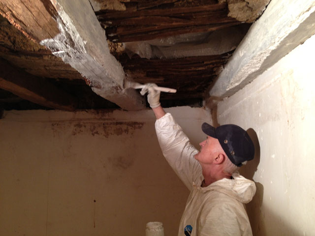 Painting the beams with limewash