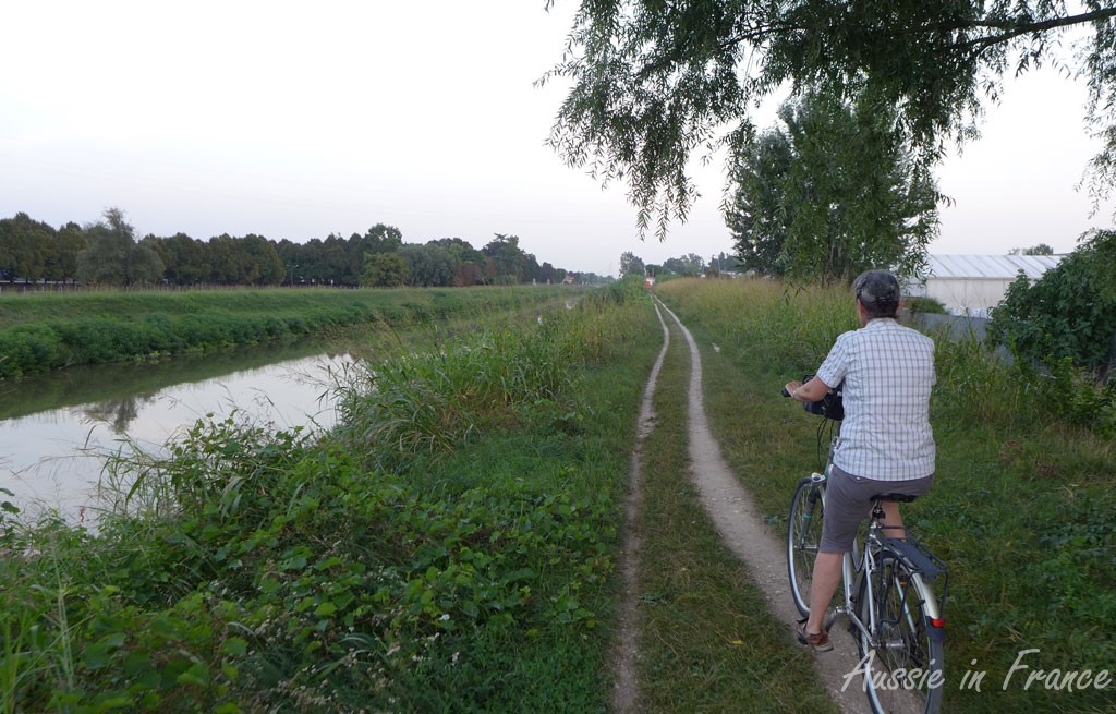 Riding along the rutted canal road