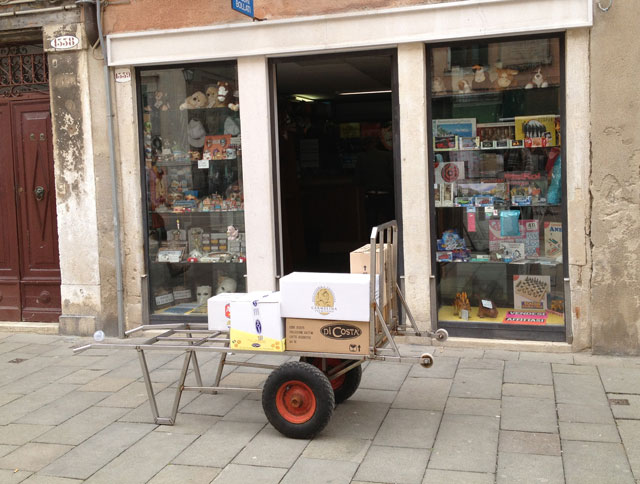 Standard cart with two extra small wheels for going up hump-backed bridges