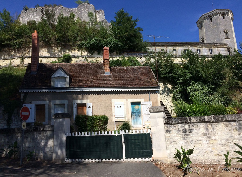 The château up on the hill seen from a house near the tourist office