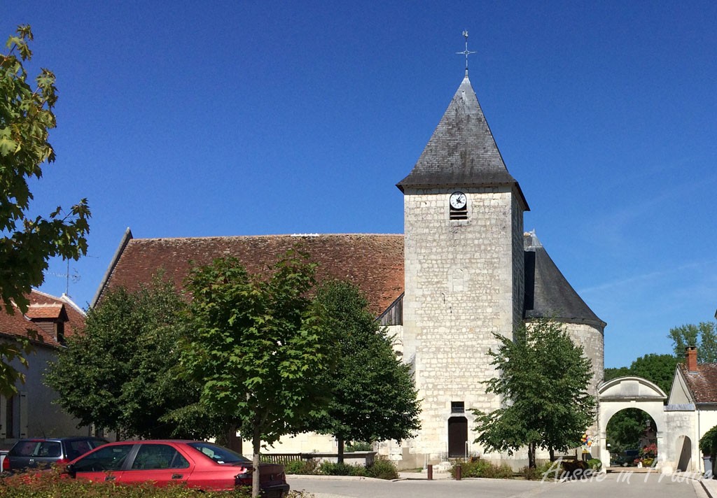 The church with its unusual archway in Pouillé