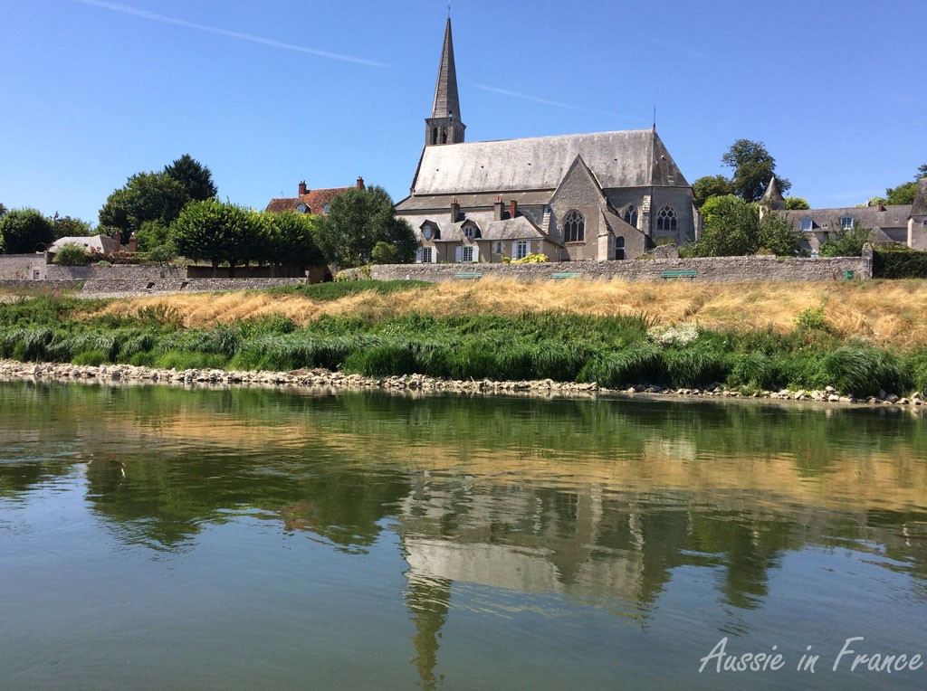 Cour-sur-Loire church reflected in the Loire