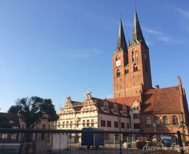 St Jacob''s Gothic cathedral in Stendal with the rathaus in front