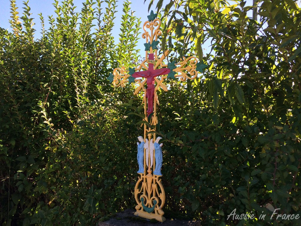 Colourful roadside cross