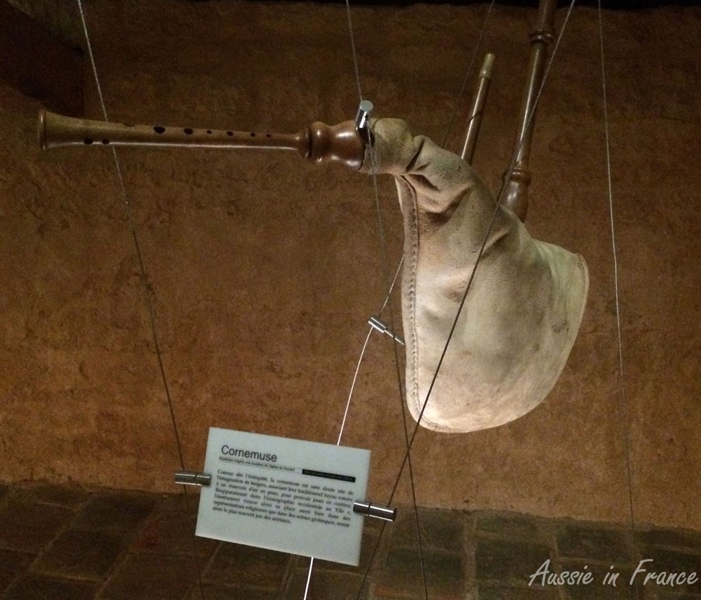 Mediaeval bagpipes which start playing as you approach. The only problem is that the previous instrument is still playing another tune ...
