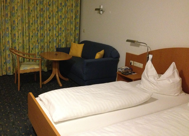 Double bed with two mattresses and two covers