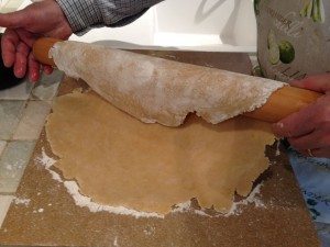 Transferring the dough onto the rolling pin