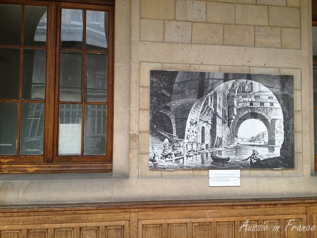 Etching on the first floor gallery of Hôtel Dieu