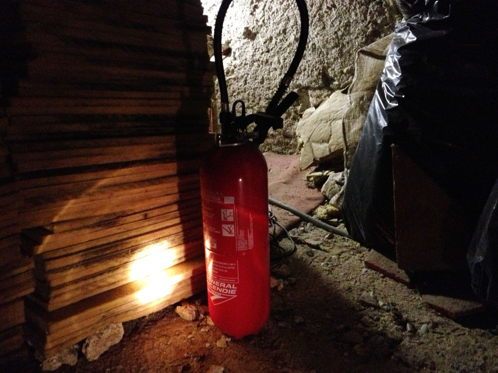 Extinguisher at the read just in case the insulation caught fire