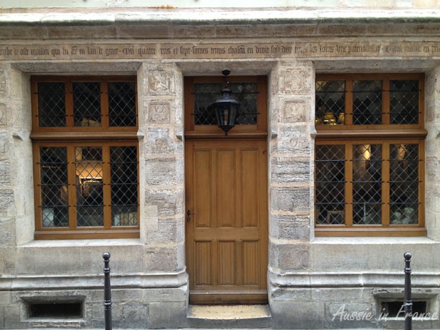 The façade of Nicolas Flamel's house with its inscription