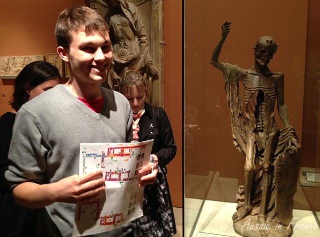 Finding the first treasure - you can see the highlighted map of the Louvre in Eric's hands