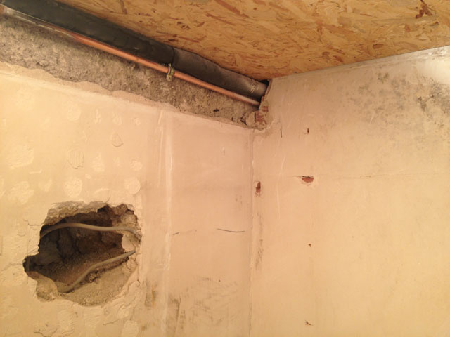 Large hole to be filled with stones balanced on top of each other and wedged into place