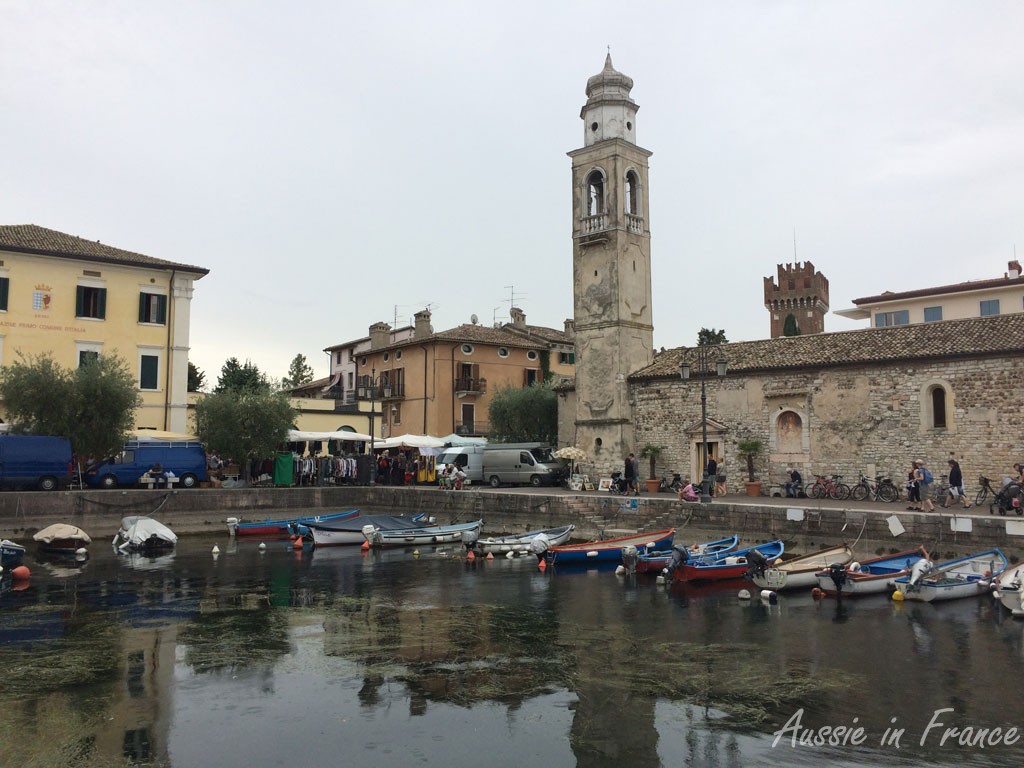The market on two sides of the port in Lazise