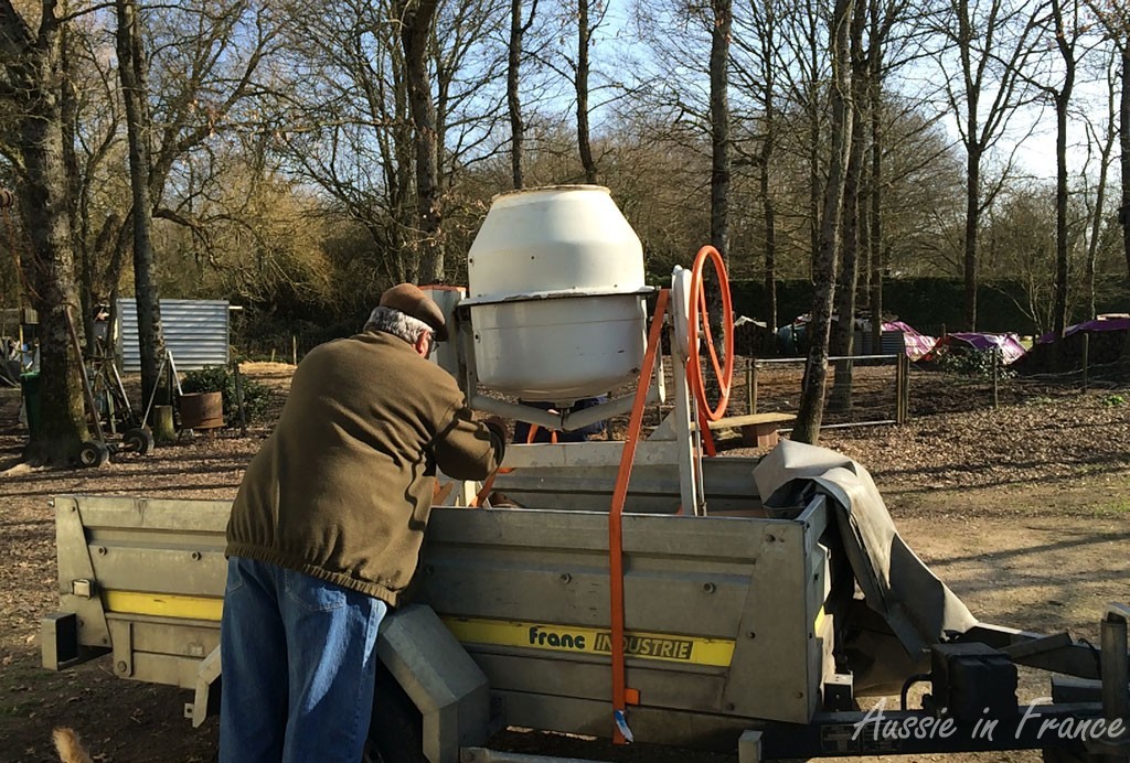 Getting the cement mixer onto the trailer