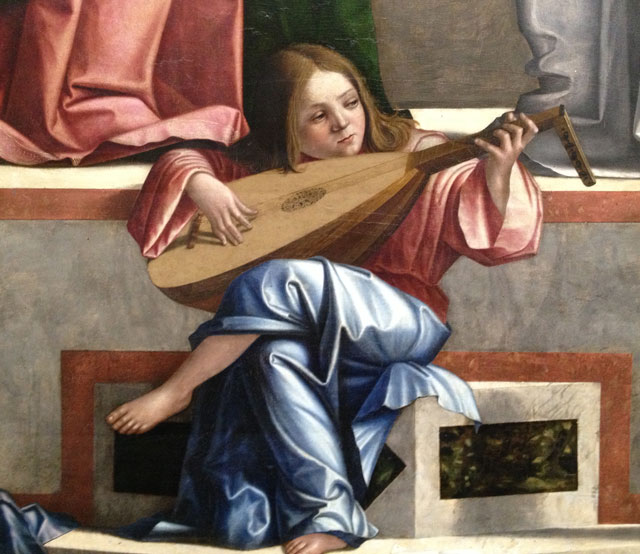 The mandoline player in Carpaccio's Presentation