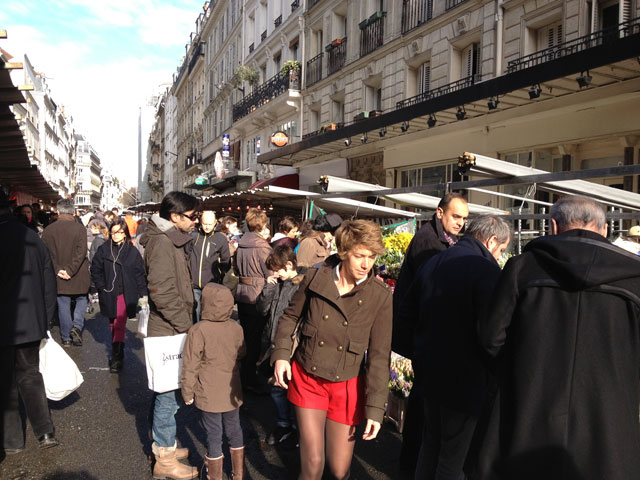 Sporting shorts at the market despite the temperature!