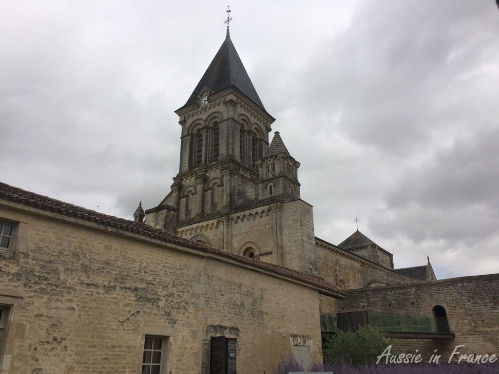 The church spire at Neuil Abbey seen from the mediaeval garden