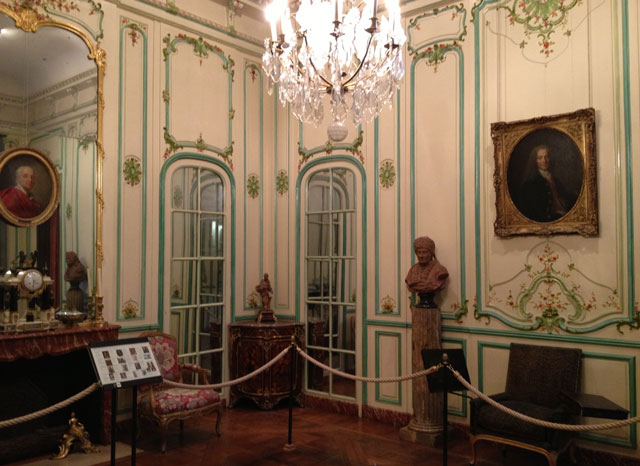 Beautiful wood panelling with Voltaire's chair on the right