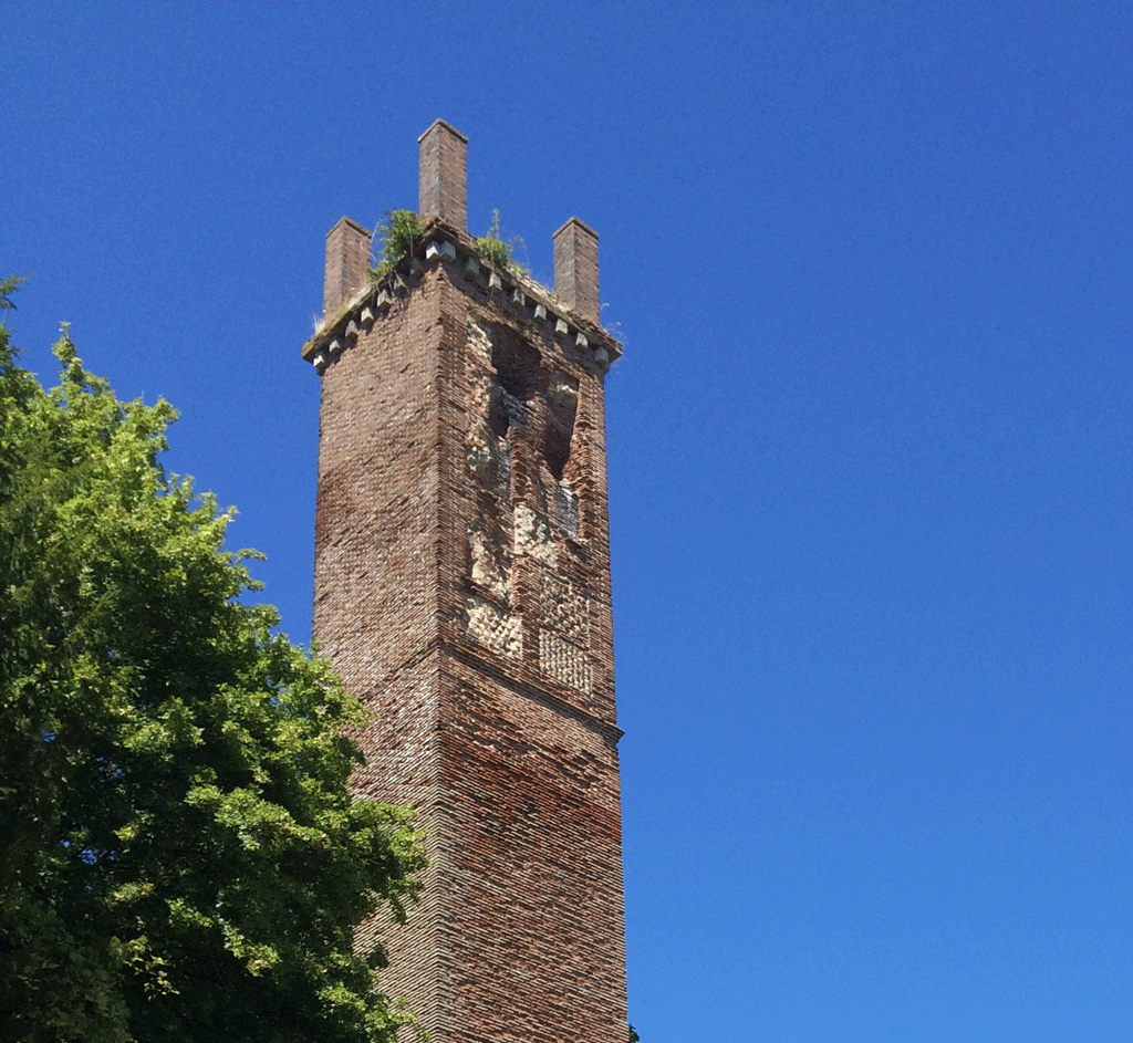 A close-up of Cinq-Mars tower with its decorative brick panels