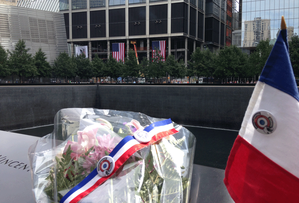 The second memorial with a bouquet from the French firemen