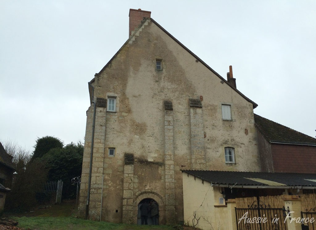 The priory from the back. You can see the archway leading into the chapel.