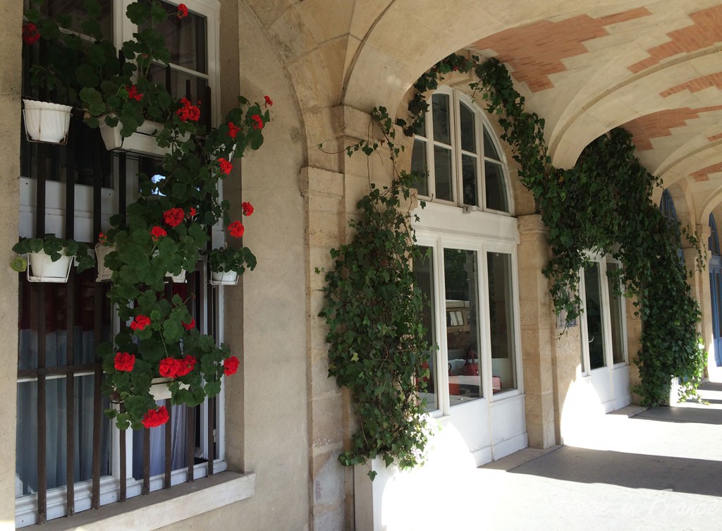 Flowers in the arcades around Place des Vosges
