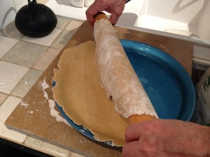 Placing the dough on the tart plate