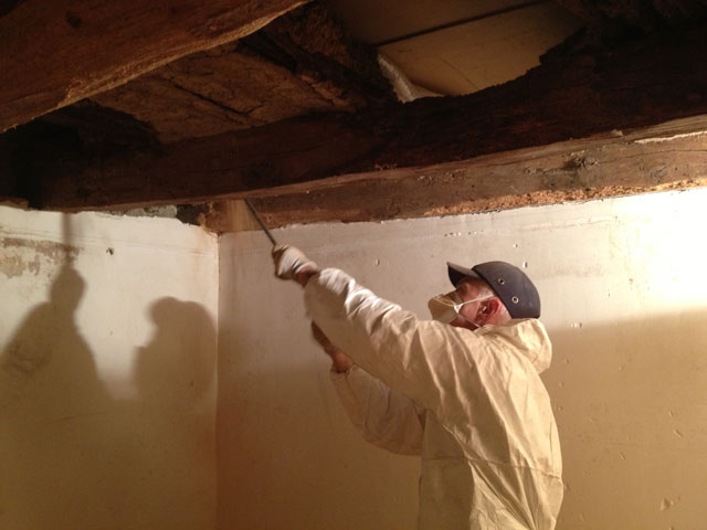 Jean Michel poking at the beams