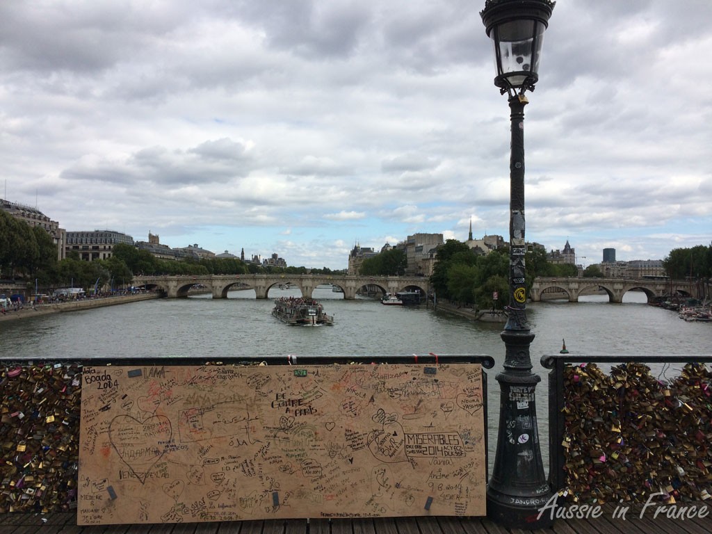 The panels and broken fence on Pont des Arts