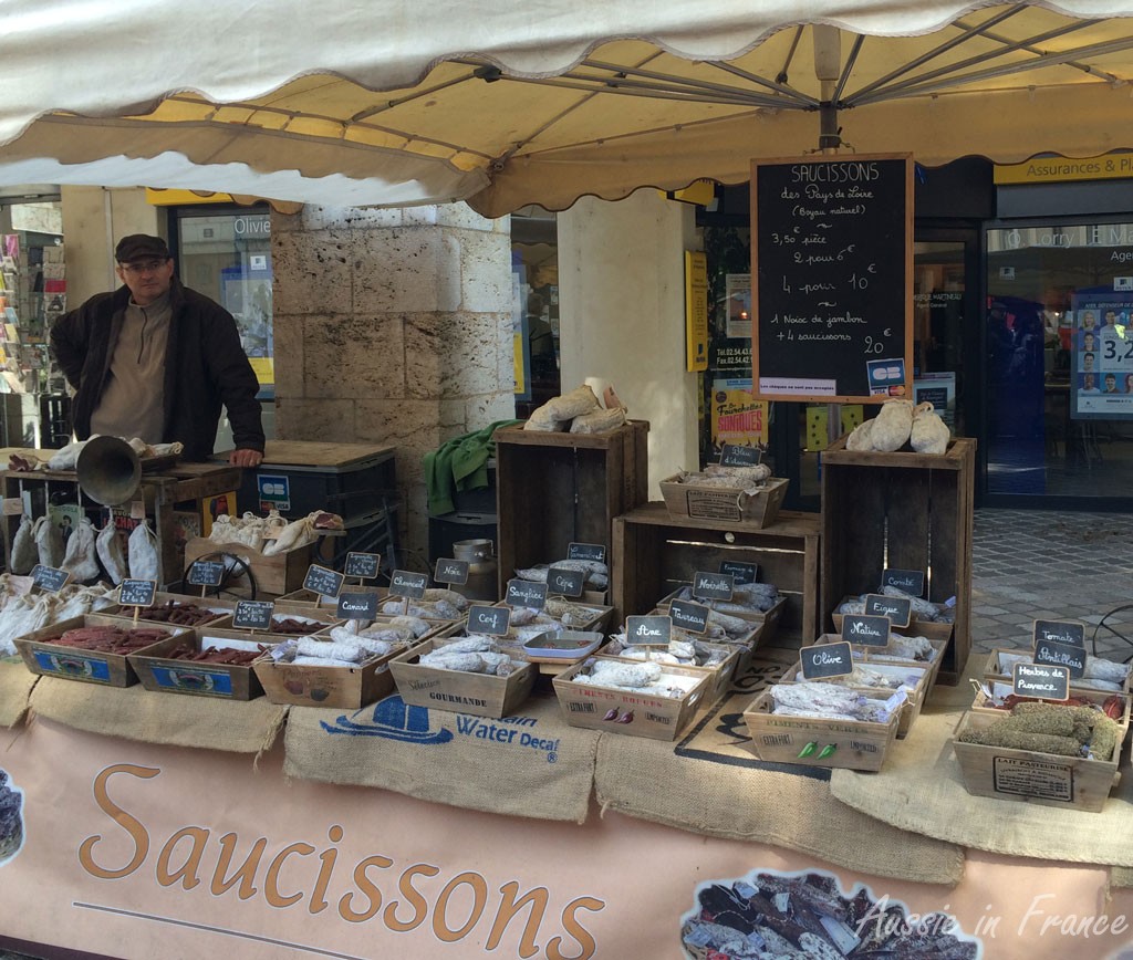 The saucissons vendor on the market with local varieties such as deer and wild boar.