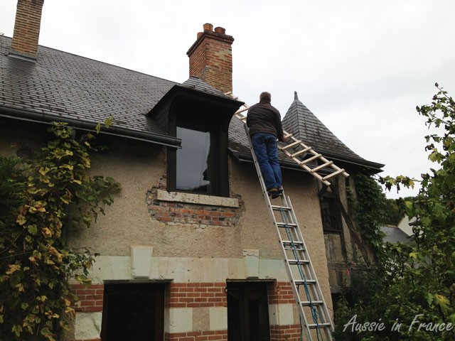 Mr B. taking up the second ladder